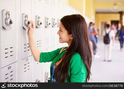 Female High School Student Opening Locker