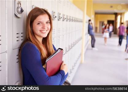 Female High School Student Standing By Lockers
