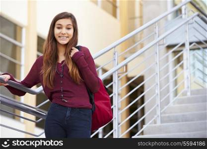 Female High School Student Standing Outside Building