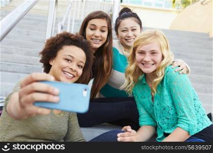 Female High School Students Taking Selfie Photograph