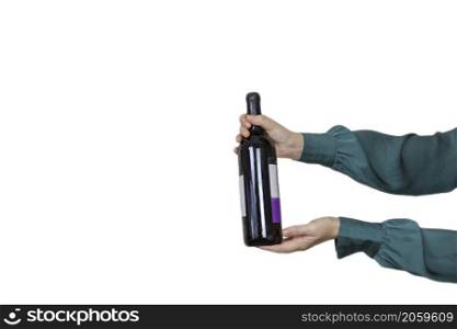 Female holding bottle of expensive red wine isolated on white background, giving gift, party, alcohol concept space for text. Female holding bottle of expensive red wine isolated on white background, giving gift, party, alcohol concept