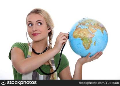 female, holding, globe