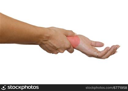 Female holding hand to spot of wrist pain.