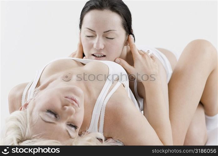 Female homosexual couple romancing
