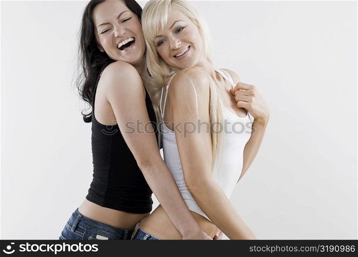 Female homosexual couple smiling