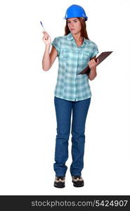 Female inspector holding clipboard