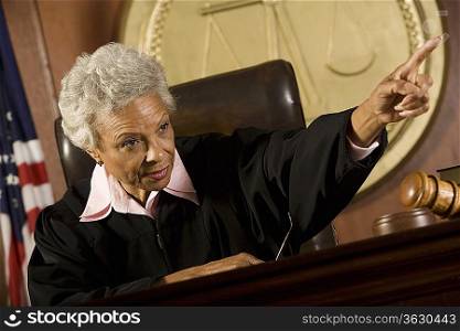 Female judge giving order in court
