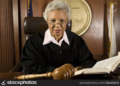 Female judge sitting in court, portrait