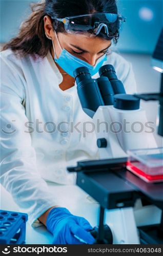 Female Junior Researcher in the Lab