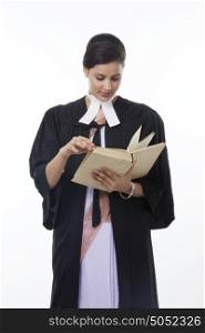 Female lawyer reading a book