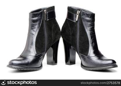 Female leather boots. It is isolated on a white background