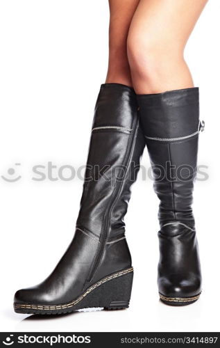 female legs in elegant winter boots