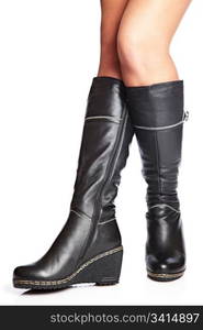 female legs in elegant winter boots