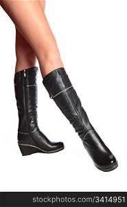 female legs in elegant winter boots