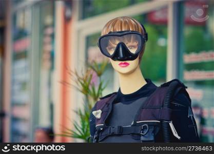 Female mannequin with diving mask