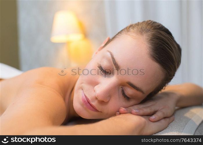 female massage client sleeping