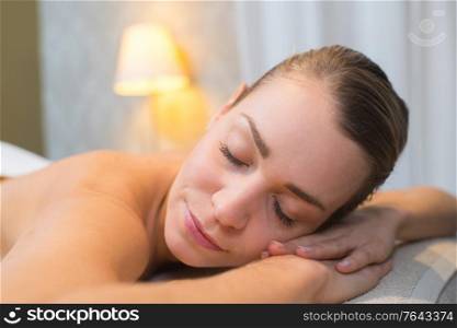 female massage client sleeping