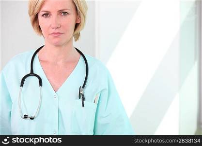 Female medic with a stethoscope