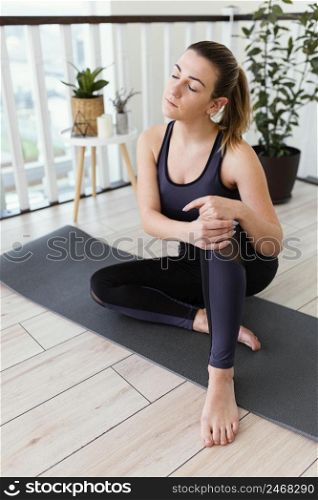 female meditating indoor 4