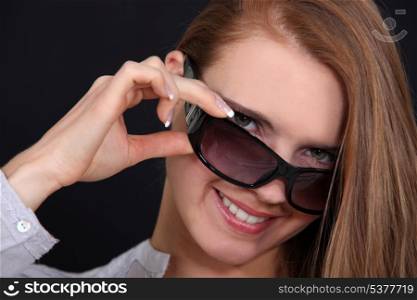 Female model with sunglasses.