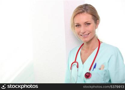 Female nurse in hospital scrubs