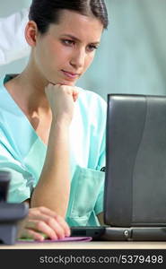 Female nurse with laptop