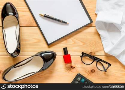 Female office clothes and accessories from top view