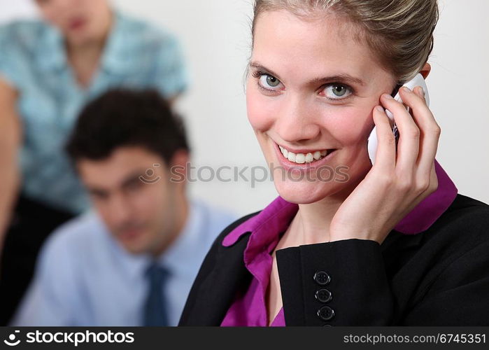 Female office worker on the telephone