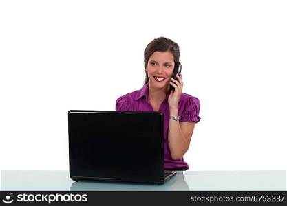Female office worker on the telephone