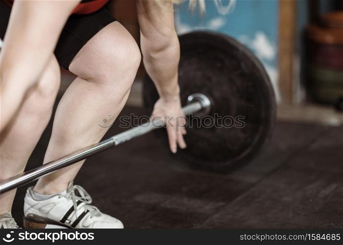 Female on weightlifting training