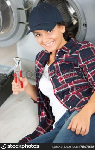 female opening washing machine