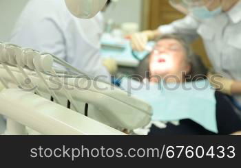 Female patient at the dentist surgery