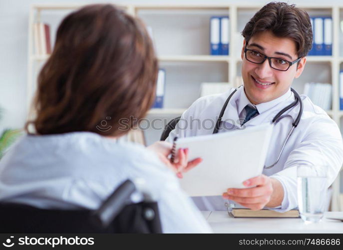 Female patient visiting male doctor for regular check-up in hospital clinic. Female patient visiting male doctor for regular check-up in hosp