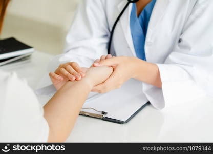 Female patient visits woman doctor or gynecologist during gynaecology check up in office at the hospital. Gynecology healthcare and medical service.