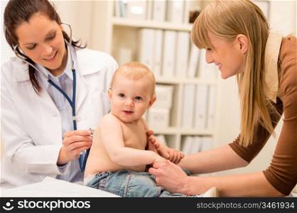 Female pediatrician checking cute baby girl with stethoscope