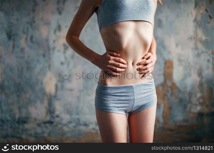 Female person with slim waist, weight loss, anorexia. Fat or calories burning concept, illness. Female with slim waist, weight loss, anorexia