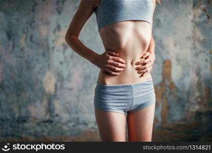 Female person with slim waist, weight loss, anorexia. Fat or calories burning concept, illness. Female with slim waist, weight loss, anorexia