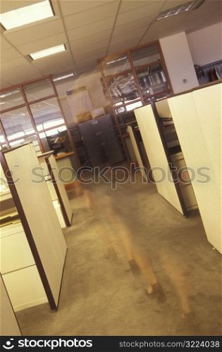 Female Phantom Walking Through An Empty Office