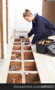 Female Plumber Fitting Central Heating System