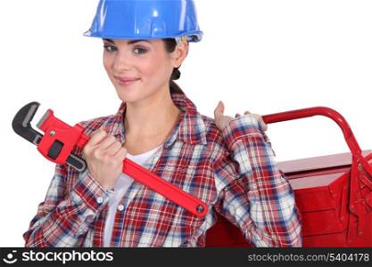 Female plumber ready for her next job