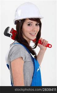 Female plumber with wrench