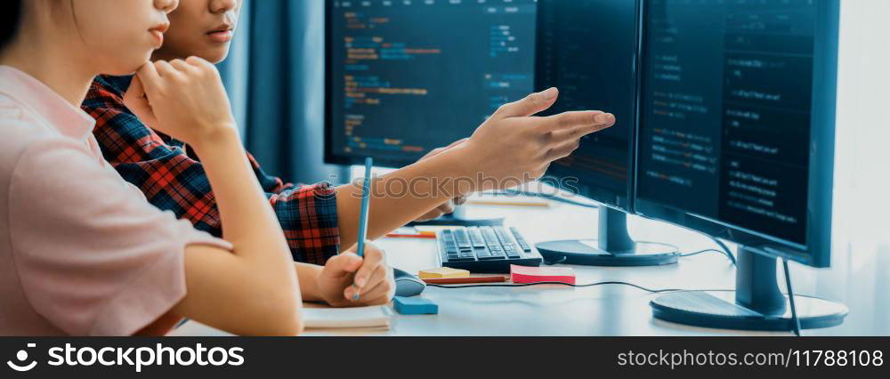 Female programer explain while pointing code displayed on computer. Professional programmer present data analysis and writing java script at modern company office. Closeup. Burgeoning.. Female programer explain while pointing code displayed on computer. Burgeoning.