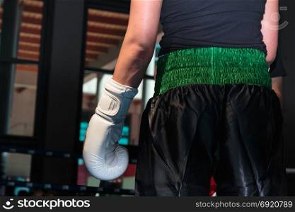 Female Pugilist Boxe: Closeup of White Glove and Black Shorts