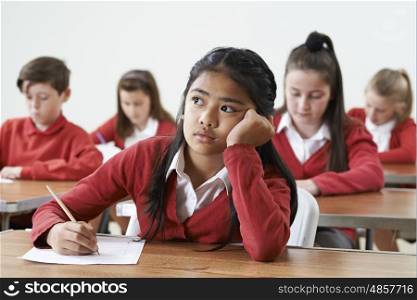 Female Pupil Finding School Exam Difficult