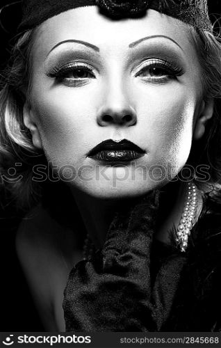 Female retro revival portrait. 30&acute;s of the XX century. Professional makeup