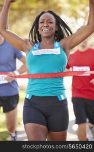 Female Runner Winning Marathon