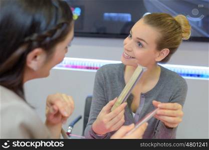 female sales clerks at perfume store