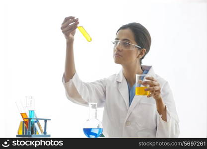 Female scientist experimenting in lab