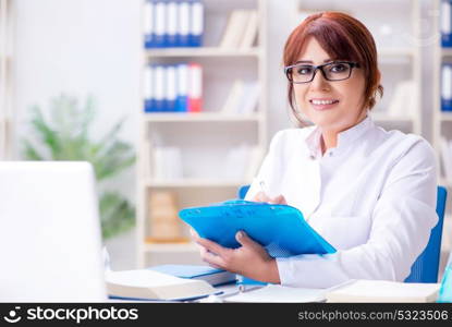 Female scientist researcher conducting an experiment in a labora. Female scientist researcher conducting an experiment in a laboratory