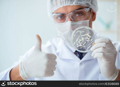 Female scientist researcher conducting an experiment in a labora. Female scientist researcher conducting an experiment in a laboratory